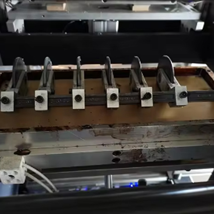 Dispositivo de pegado de fondo